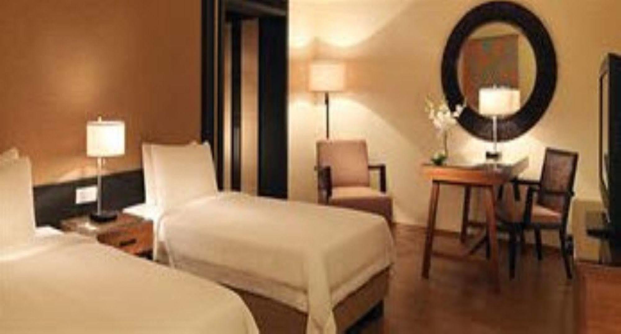 منتجع حياة ريجنسي كوانتان المظهر الخارجي الصورة A room at the hotel