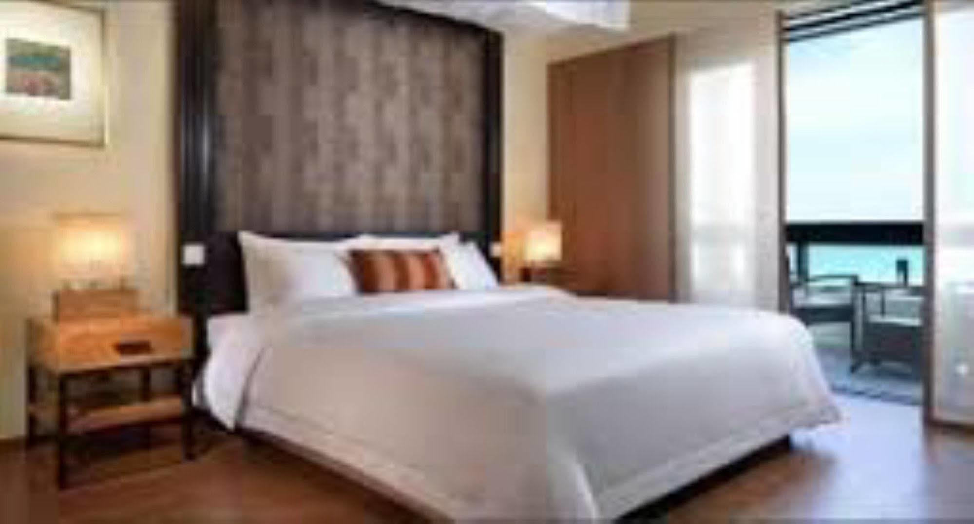 منتجع حياة ريجنسي كوانتان المظهر الخارجي الصورة A bedroom at the hotel